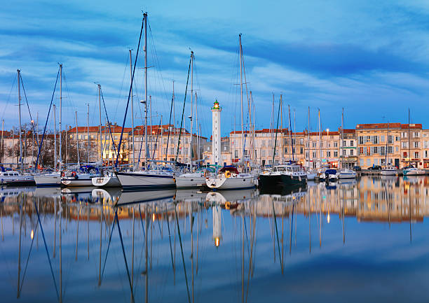 La Rochelle town reflected in Harbour at dusk